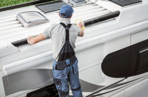 RV Trailer technician servicing a Trailer. Additional Services for RV & Boat Storage